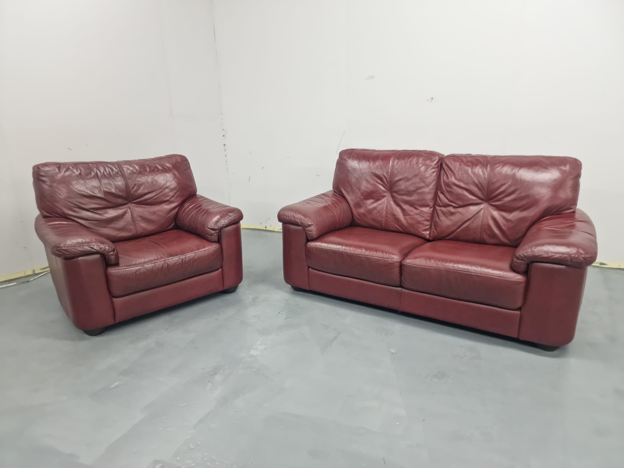 Dark red leather couches top